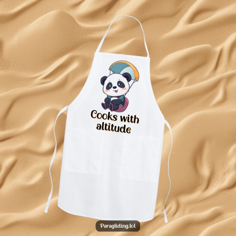 Funny apron showing a cute panda cub paragliding with slight overwhelm, perfect for kitchen adventures and a humorous touch. Gift.