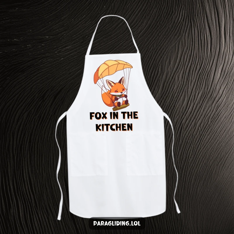 Funny determined fox apron, showcasing a fox concentrating and steering a paraglider, perfect for precise cooking.