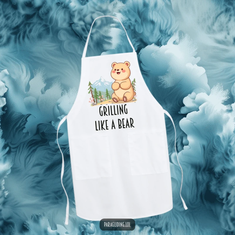Funny apron with a beaming bear enjoying a mountain view, ideal for a happy cooking experience.