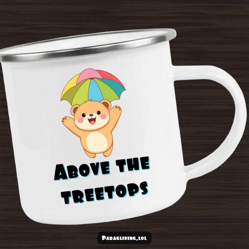 Funny camping mug with a joyful, round bear cub paragliding under a colorful canopy, perfect for enjoying beverages during outdoor adventures with a touch of whimsy.