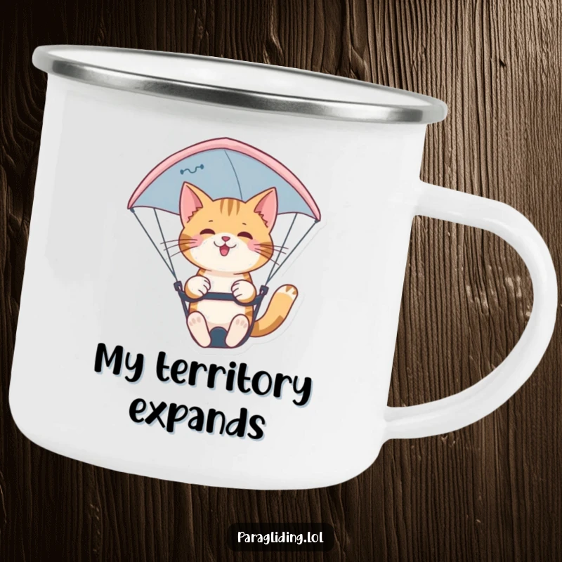 Funny confident cat paragliding nimbly on a durable camping mug. A stylish and rugged funny gift for outdoor enthusiasts.
