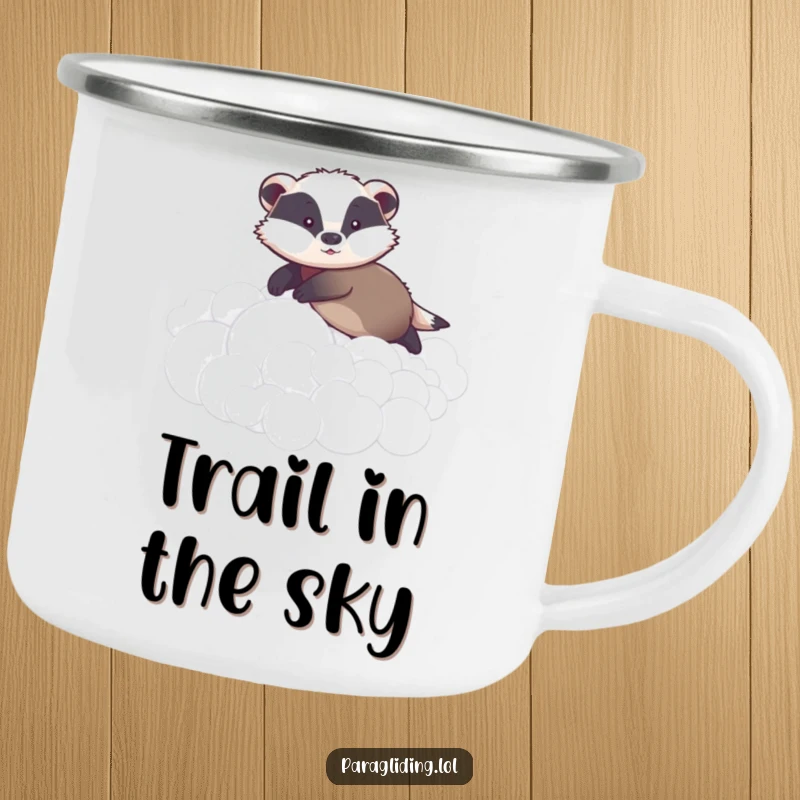 Funny camping mug featuring a graceful badger gently gliding over fluffy clouds, ideal for enjoying drinks during peaceful outdoor excursions.