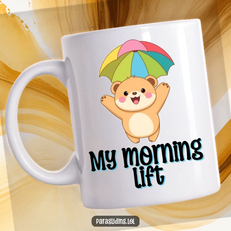 Funny mug with a joyful, round bear cub paragliding happily under a vibrant, colorful canopy, symbolizing adventure and carefree exploration.