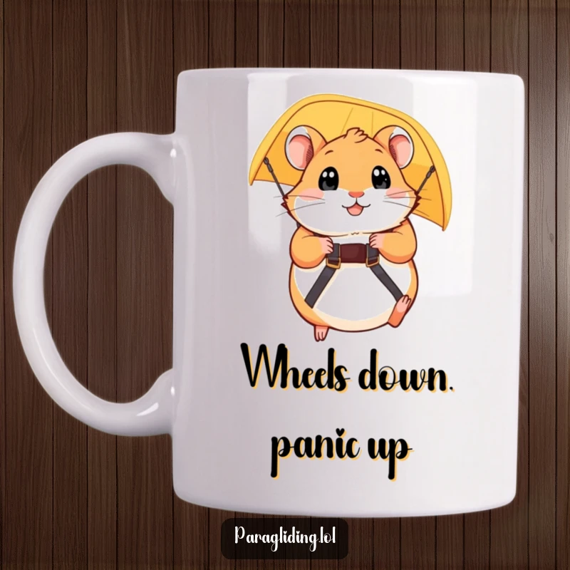 Funny paraglider mug featuring a plump, wide-eyed hamster holding on tightly to a strap, experiencing a wild, humorous flight. Gift.