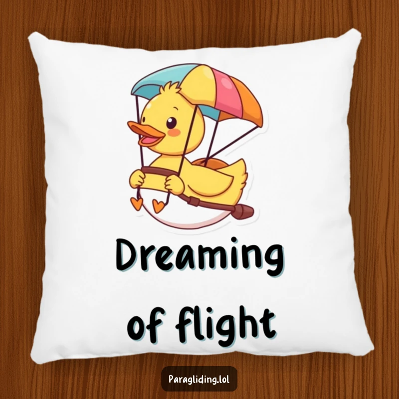 Funny pillow with a cheerful duck delighting in the view from its colorful paraglider, soft and amusing.