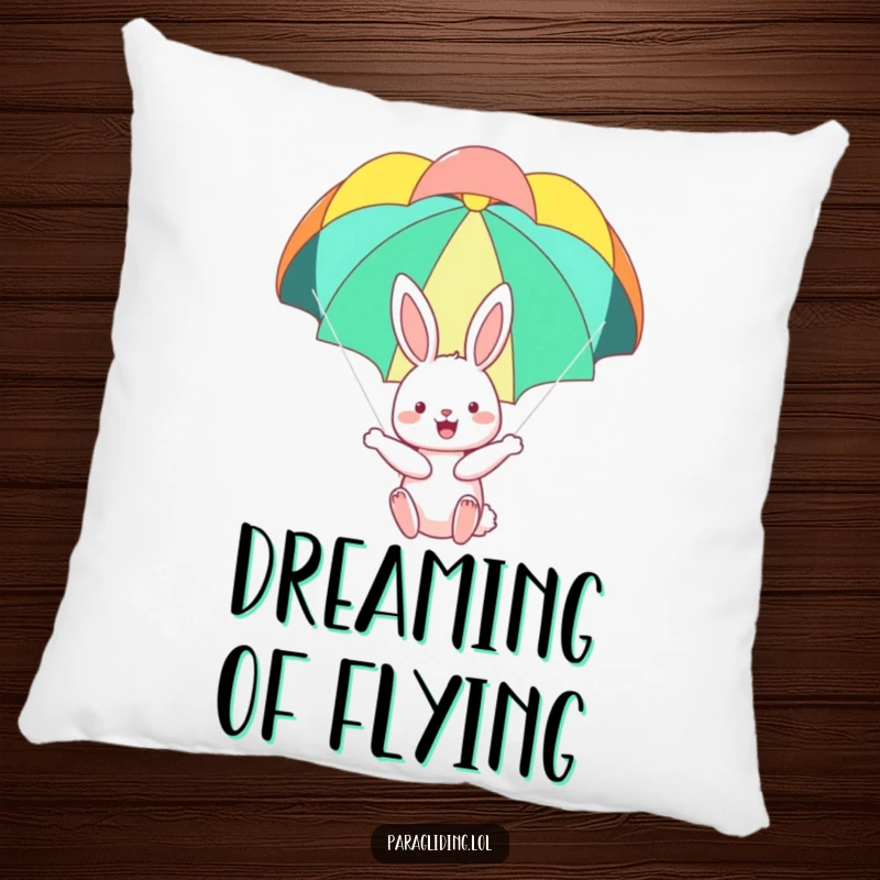 Funny pillow depicting a happy bunny floating serenely under a colorful parachute, offering a comfortable and whimsical accent for any room.