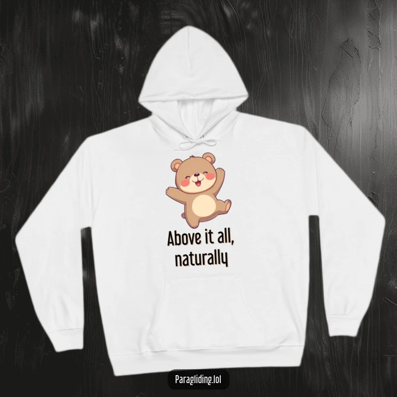 Funny playful bear bobs joyfully in the air, a cozy hoodie capturing the essence of airborne happiness.