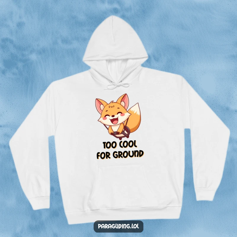 Funny fox paragliding with a wide, excited grin, a cozy hoodie for adventures, capturing airborne happiness and excitement.