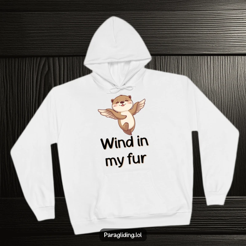 Funny hoodie with a giggling otter dancing and flying merrily on the breeze, providing cozy, cheerful warmth.
