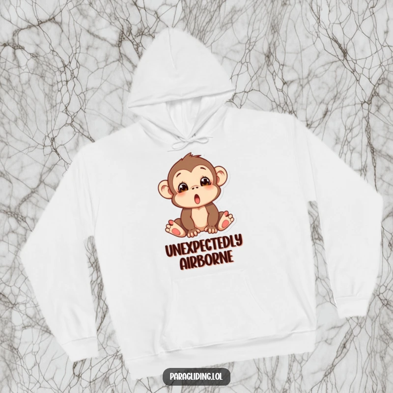Funny hoodie with a silly monkey looking utterly surprised, as if it's about to tumble, bringing warmth and humor.