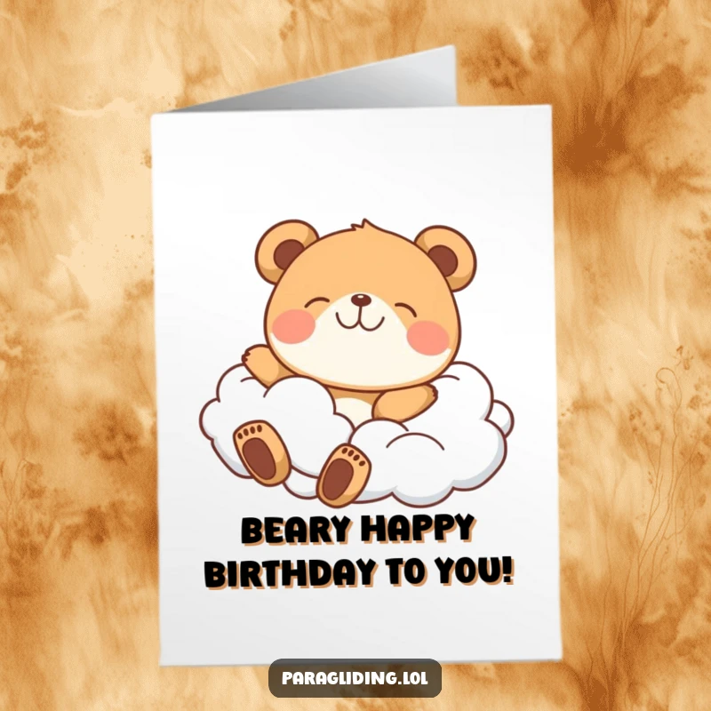 Funny Free Printable Birthday Card: A happy bear blissfully drifting on fluffy clouds, perfect for a lighthearted celebration.