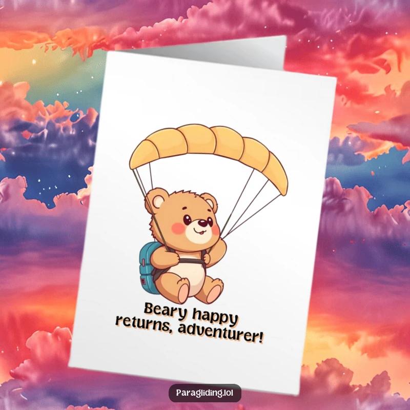 Funny free printable birthday card featuring a curious bear cub amazed by the view while paragliding. A delightful downloadable.