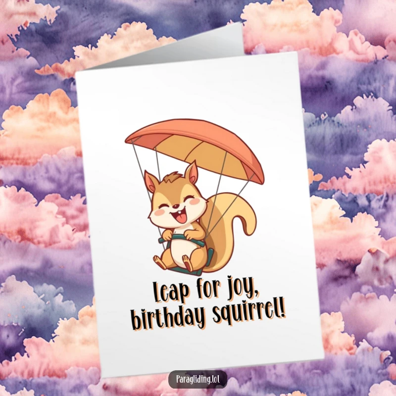 Funny Free Printable Birthday Card: A tiny squirrel, giggling with delight, expertly steers a paraglider, waving happily at the world below.