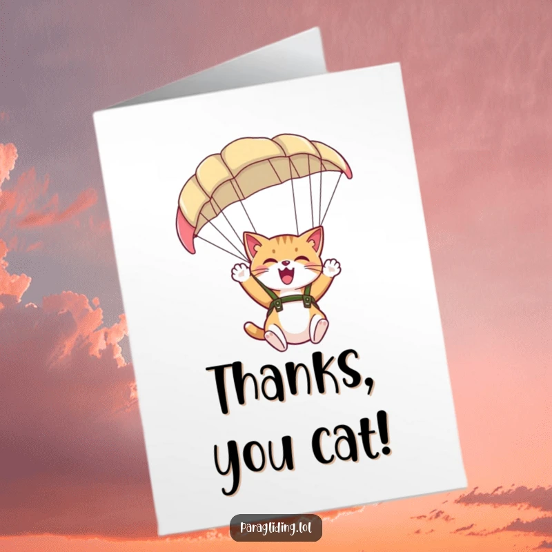 Funny Free Printable Thank You Card featuring a giggling cat waving enthusiastically from beneath a large paraglider, expressing cheerful gratitude.