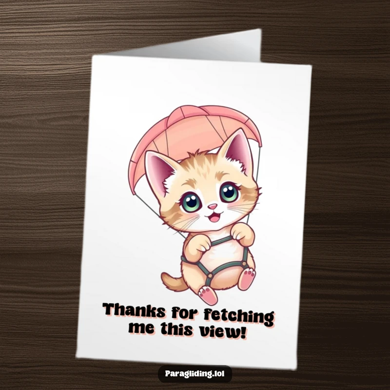 Funny free printable thank you card with an adventurous kitten paragliding, expressing thanks from the sky. A charming DIY greeting.