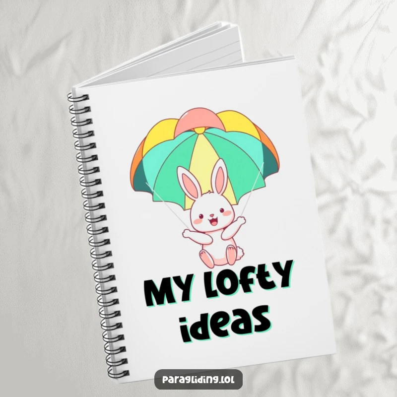 Funny notebook with a happy bunny floating serenely under a colorful parachute, perfect for jotting down thoughts with a sense of joy.