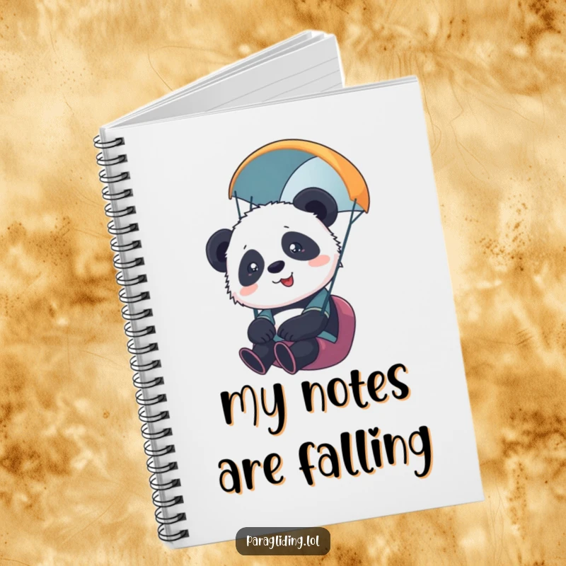 Funny notebook with a cute, slightly overwhelmed panda cub paragliding, perfect for jotting down thoughts or drawing adventures. Great gift.
