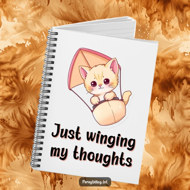 Funny Kitten Paraglider Notebook showing a curious kitten enjoying an aerial journey on a paraglider, perfect for capturing ideas.