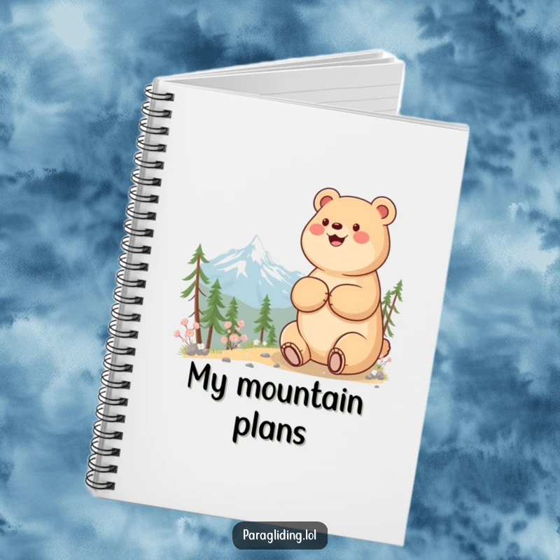 Funny notebook with a beaming bear enjoying a mountain view, perfect for jotting down thoughts.