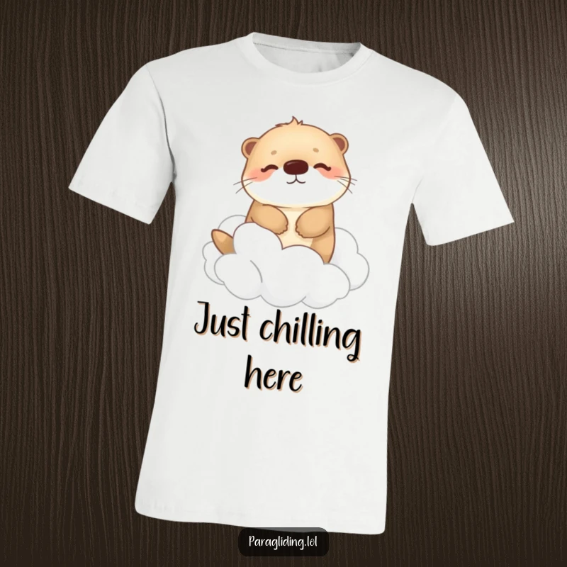 Funny t-shirt with a happy, fluffy otter drifting peacefully among fluffy clouds, embodying a feeling of weightless joy and calm.