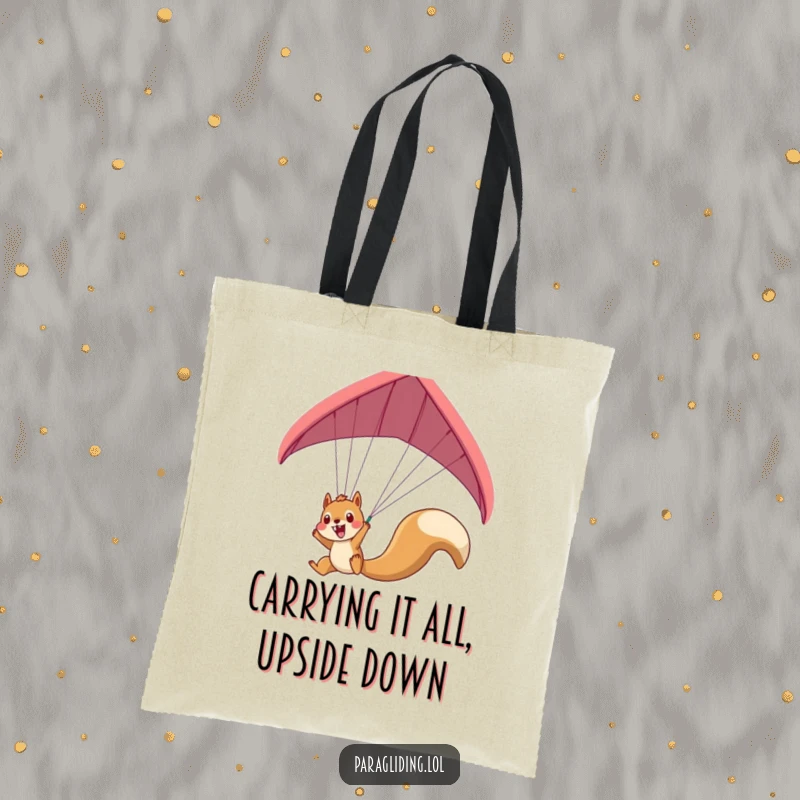 Funny squirrel paraglider tote bag featuring an excited squirrel dangling, a humorous and functional accessory.