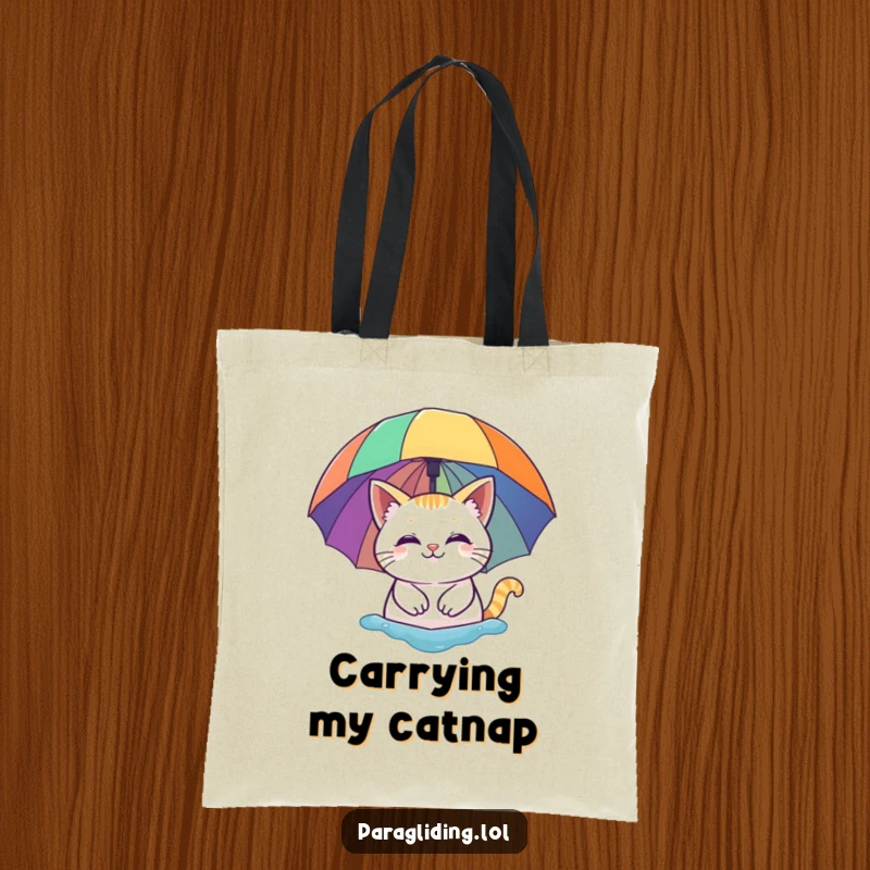Funny tote bag: A smiling cat floating peacefully under a vibrant rainbow umbrella. A charming and humorous accessory for daily use.