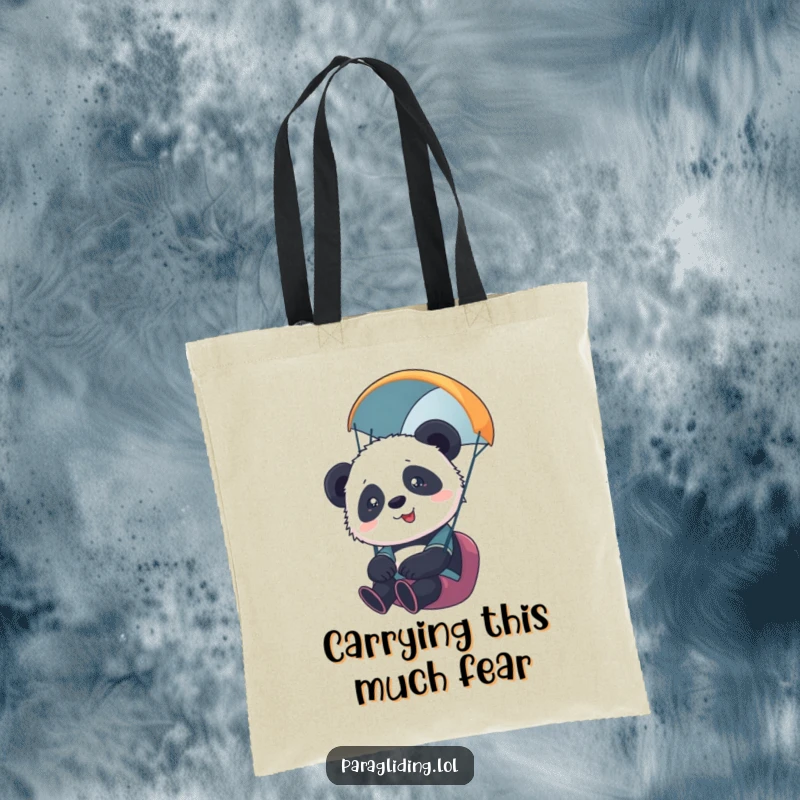 Funny tote bag showcasing a cute, overwhelmed panda cub paragliding, capturing a moment of exhilarating, high-flying fun. Perfect.