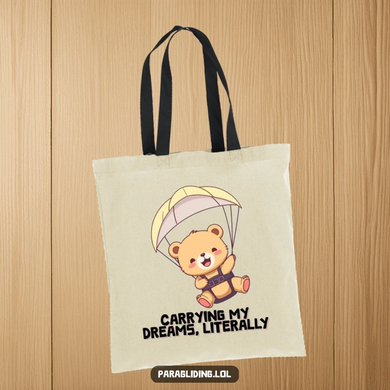 Funny bear cub paraglider tote bag featuring a joyful cub soaring with a paraglider, a delightful and functional accessory.
