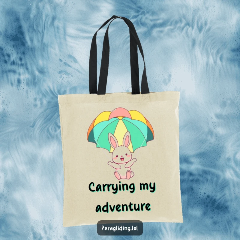 Funny tote bag featuring a happy bunny floating serenely under a colorful parachute, a charming accessory for carrying essentials with joy.