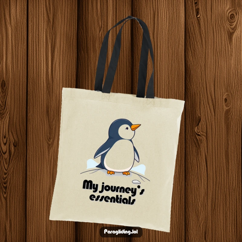Funny penguin tote bag, a reusable bag with a penguin observing landscape from a paraglider, perfect for errands.